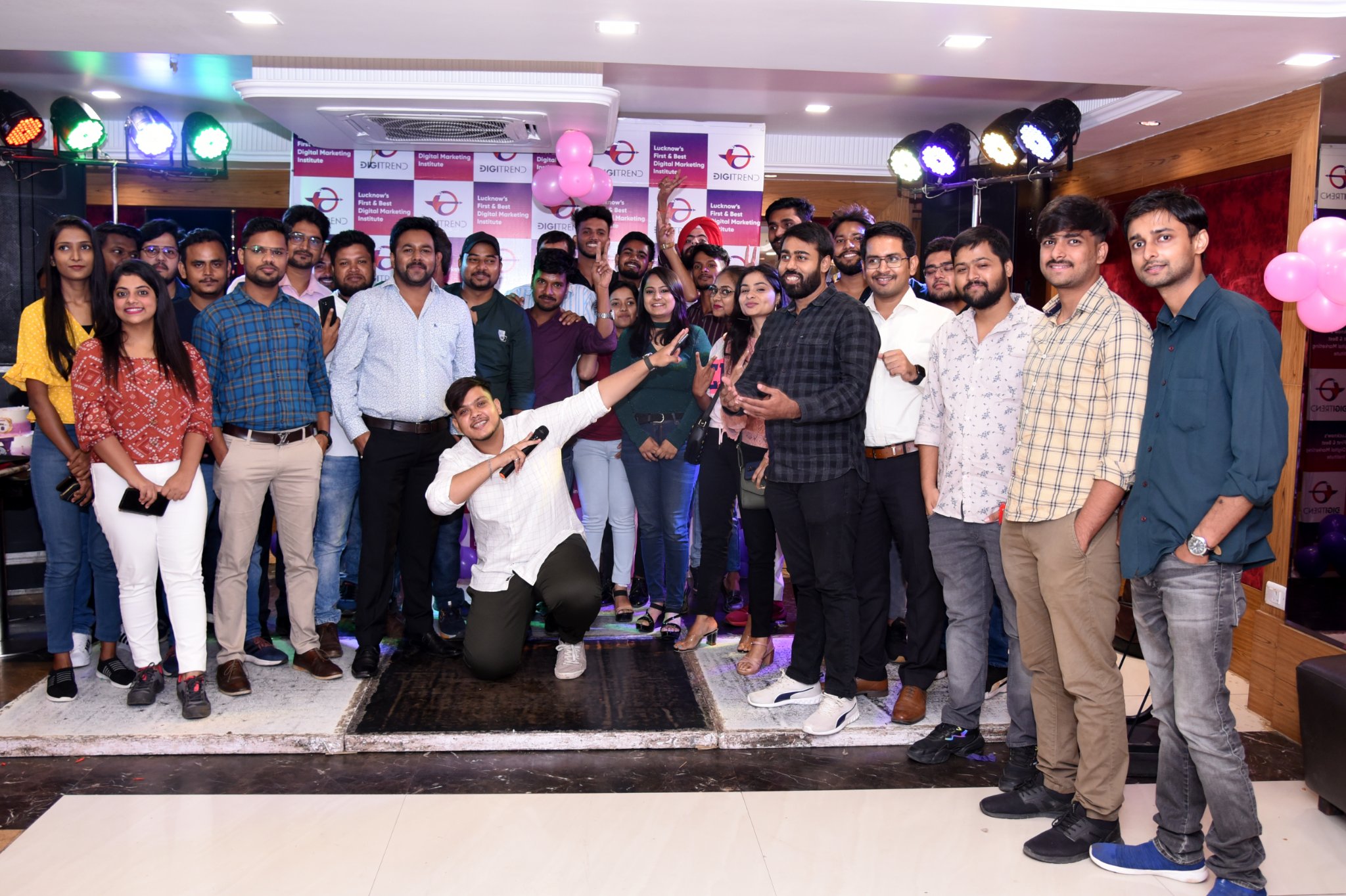 A group of people posing for a photo to celebrate 10 years of DigiTrend Institute’s digital marketing training in Lucknow.