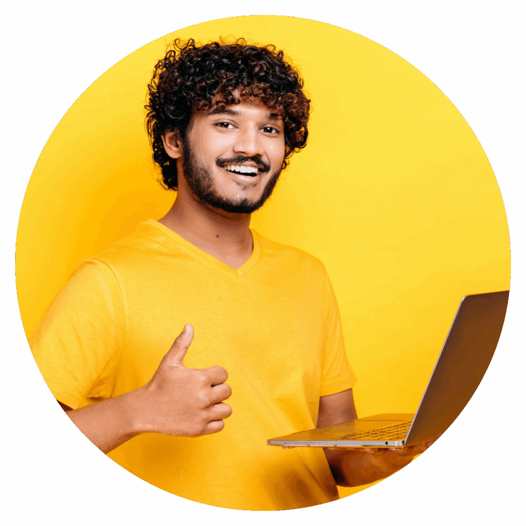 A boy holding a laptop in his left hand and showing thumbs up in his right hand. Learn a digital marketing course in Lucknow.